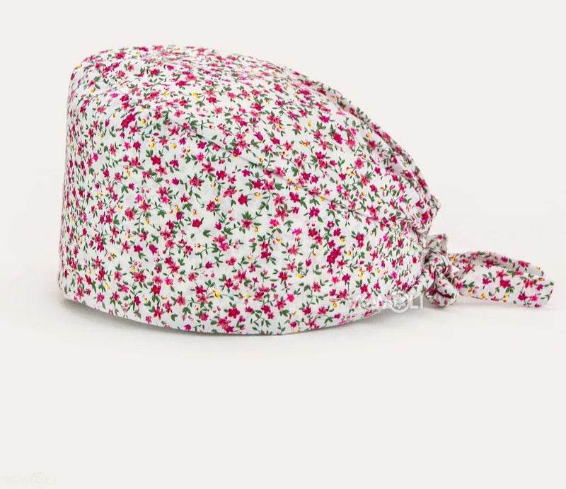Check out these the Flower-Printed OR Caps! You know, because nothing says 'I'm a professional' like wearing a cap that looks like a garden party exploded on your head hat 1 One Size