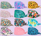 Check out these the Flower-Printed OR Caps! You know, because nothing says 'I'm a professional' like wearing a cap that looks like a garden party exploded on your head